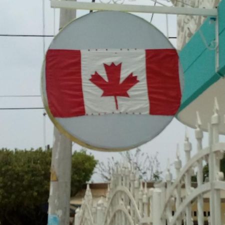 Canadian House Tolu Hotel Exterior photo